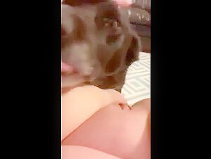 Loud girl moaning licked by dog