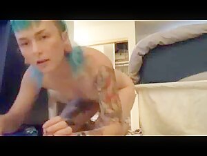 Tattooed young punk girl fucks dog and films herself