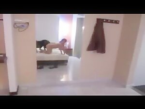 mature housewife play with dog