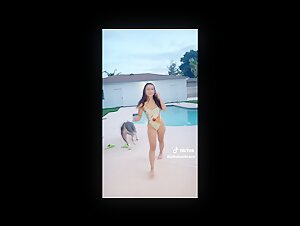 Tiktok girl dancing and playing with her dog (no sex)